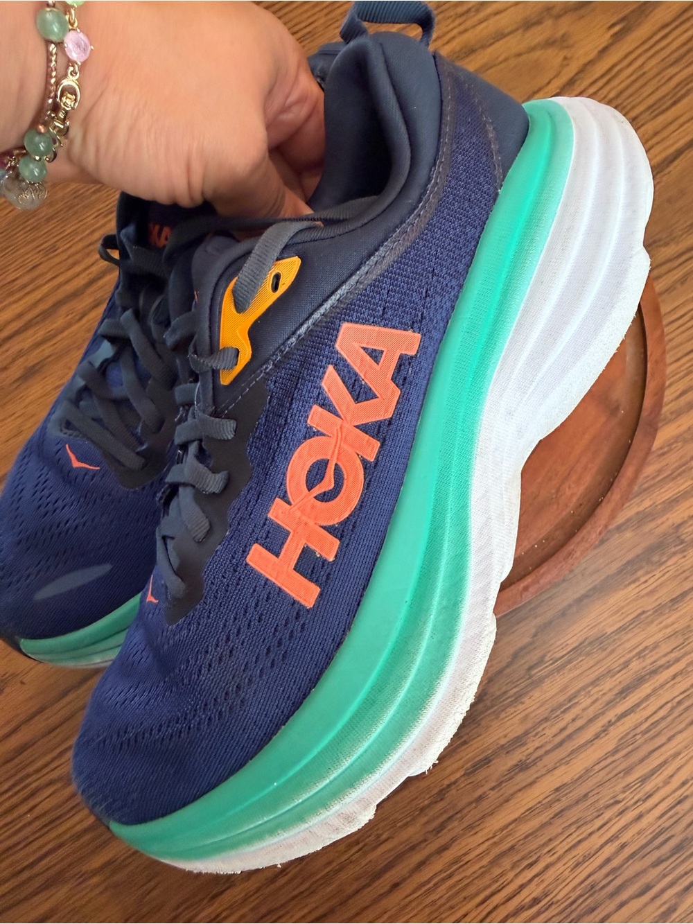 Hoka Navy Running Shoes with Teal Midsole and Orange Logo - Picture 2 of 9